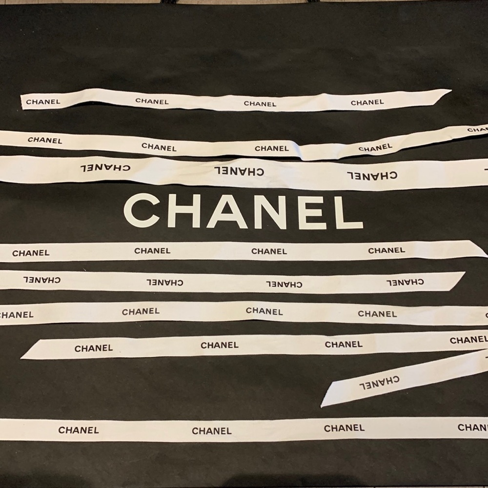 Chanel white black lettering logo ribbons. Set of 8